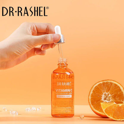 DR.RASHEL Vitamin C serum bottle with dropper and oranges on an orange background