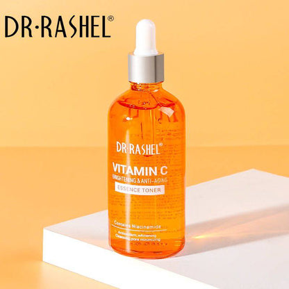 DR RASHEL Vitamin C essence toner bottle on a yellow background